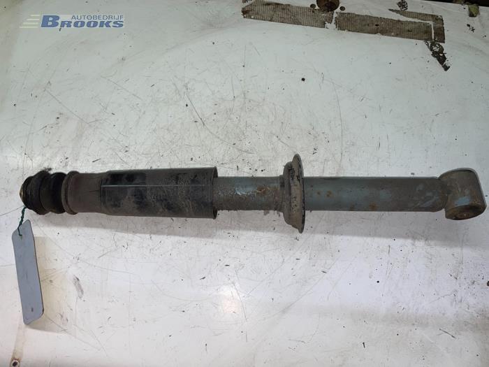 Rear shock absorber, left from a Audi Cabrio (B4) 2.3 E 1993