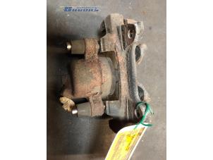 Used Front brake calliper, left Fiat Punto I (176) TD 1.7 60 Price € 10,00 Margin scheme offered by Autobedrijf Brooks