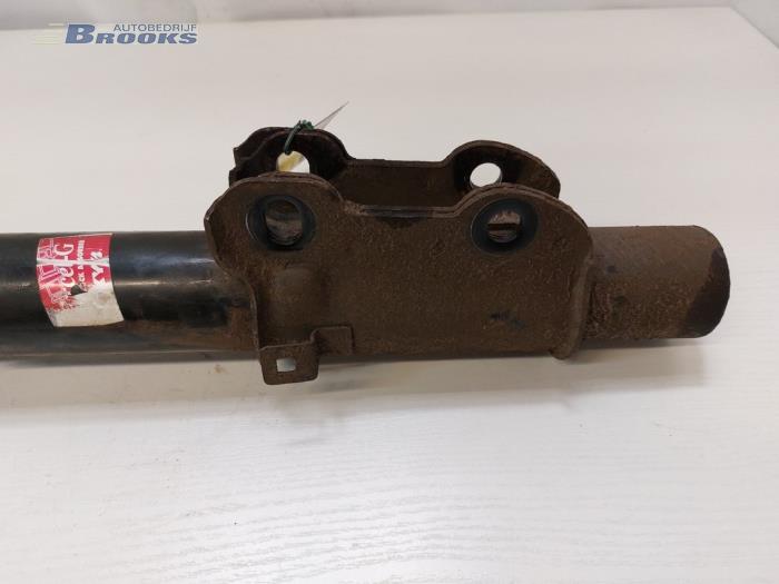 Fronts shock absorber, left from a Mercedes-Benz Sprinter 3t (906.61) 213 CDI 16V 2010
