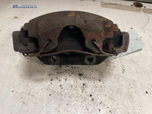 Used Front brake calliper, left Opel Vectra A (88/89) 1.8 i Price € 10,00 Margin scheme offered by Autobedrijf Brooks
