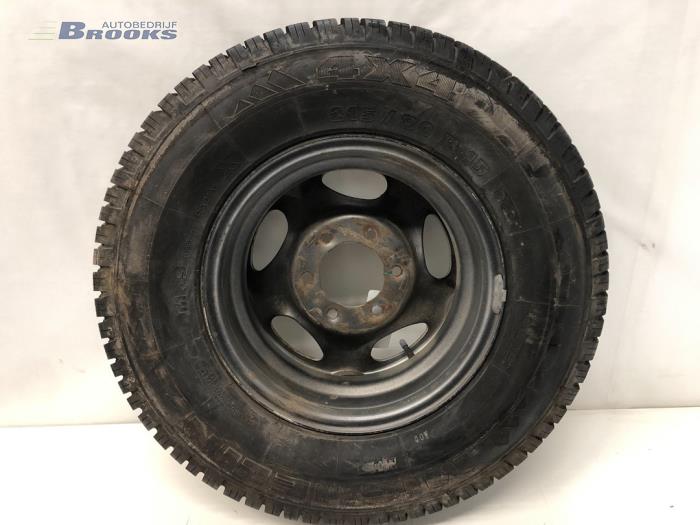 Wheel + tyre from a Ford Maverick 1994