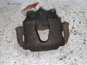 Used Front brake calliper, left Opel Astra F Caravan (51/52) 1.7 DTL Price € 20,00 Margin scheme offered by Autobedrijf Brooks