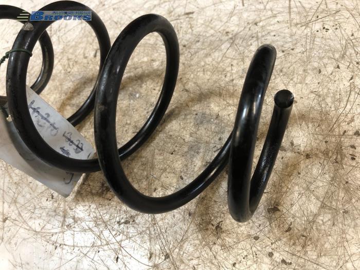 Rear coil spring from a Mercedes-Benz A (177.0) 1.3 A-200 Turbo 16V 2018