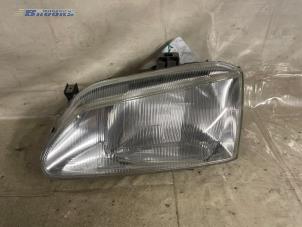 Used Headlight, left Renault Megane Classic (LA) 1.4i RL,RN Price € 10,00 Margin scheme offered by Autobedrijf Brooks