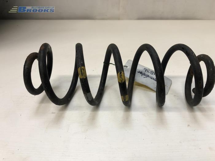 Rear coil spring from a Abarth Grande Punto 1.4 T-Jet 16V 2009