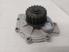 Water pump from a Volvo XC70 (SZ) XC70 2.4 T 20V 2001