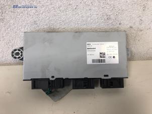 Used Central door locking module BMW 5 serie Touring (F11) 530d 24V Blue Performance Price € 100,00 Margin scheme offered by Autobedrijf Brooks