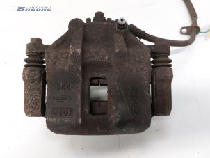Used Front brake calliper, left Kia Rio II (DE) 1.4 16V Price € 20,00 Margin scheme offered by Autobedrijf Brooks