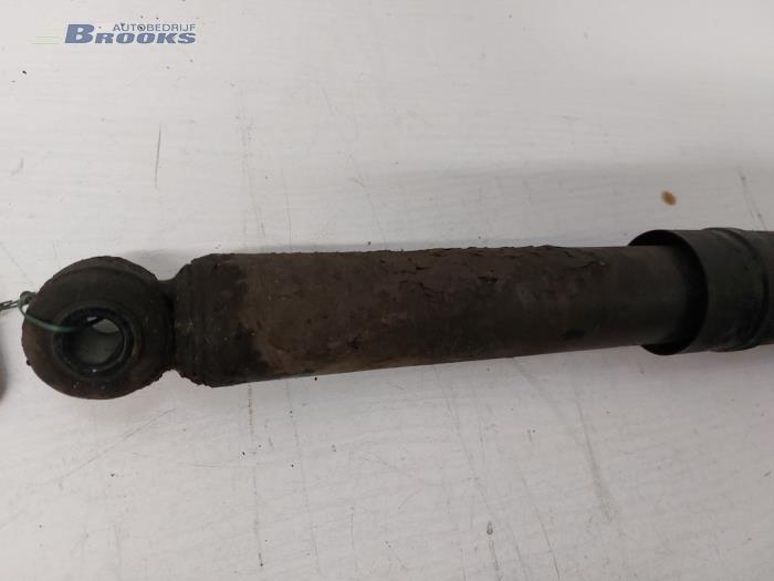 Rear shock absorber, left from a Opel Astra H (L48) 1.8 16V 2004