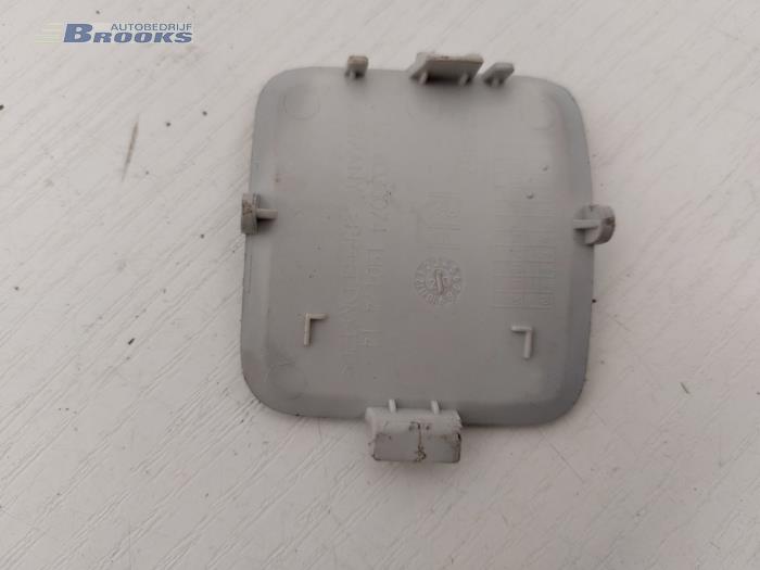 Rear towing eye cover from a BMW X1 (E84) sDrive 20d 2.0 16V 2012