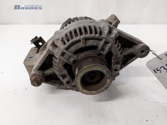 Dynamo van een Opel Corsa B (73/78/79) 1.4i 1998