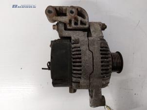 Dynamo van een Opel Corsa B (73/78/79) 1.4i 1998