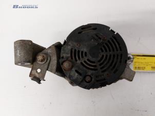 Dynamo van een Opel Corsa B (73/78/79) 1.4i 1998