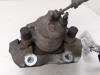 Front brake calliper, right from a Ford Focus 3 Wagon 1.0 Ti-VCT EcoBoost 12V 125 2014