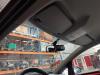 Rear view mirror from a Opel Corsa D 1.4 16V Twinport 2012
