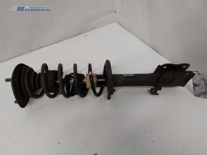 Used Front shock absorber rod, left Mitsubishi Colt (Z2/Z3) 1.3 16V Price € 20,00 Margin scheme offered by Autobedrijf Brooks