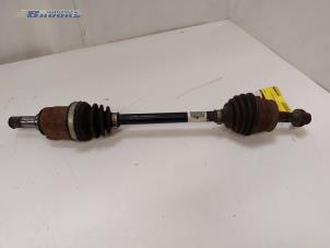 Used Front drive shaft, left Opel Corsa D 1.4 16V Twinport Price € 20,00 Margin scheme offered by Autobedrijf Brooks