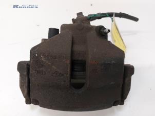 Used Front brake calliper, left Volkswagen Passat (362) 1.4 TSI 16V Price € 15,00 Margin scheme offered by Autobedrijf Brooks