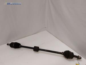 Used Front drive shaft, right Opel Corsa D 1.2 16V Price € 20,00 Margin scheme offered by Autobedrijf Brooks