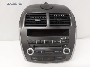 Used Radio control panel Mitsubishi ASX 1.6 MIVEC 16V Price € 40,00 Margin scheme offered by Autobedrijf Brooks