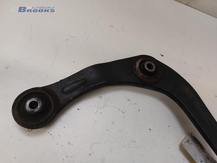 Front wishbone, left from a Peugeot 206+ (2L/M) 1.4 XS 2009