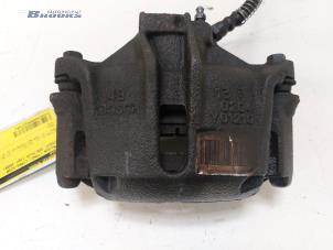 Used Front brake calliper, left Peugeot 206+ (2L/M) 1.4 XS Price € 20,00 Margin scheme offered by Autobedrijf Brooks