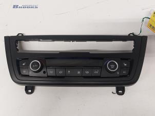 Used Heater control panel BMW 3 serie Touring (F31) 316i 1.6 16V Price € 65,00 Margin scheme offered by Autobedrijf Brooks