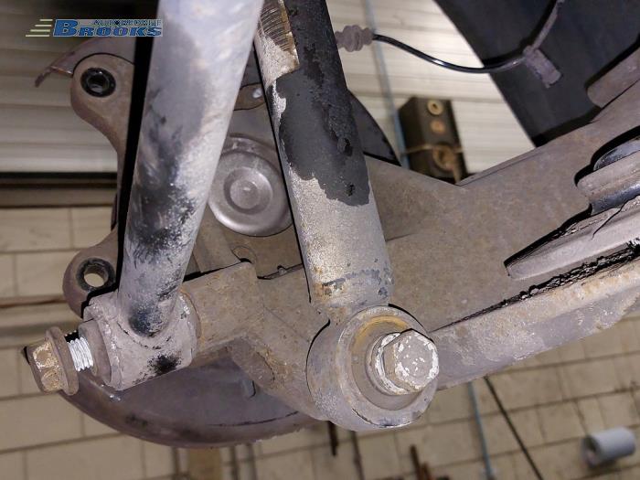 Rear shock absorber, left from a Opel Astra J Sports Tourer (PD8/PE8/PF8) 1.6 CDTI 16V 2015