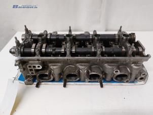 Used Cylinder head Suzuki Grand Vitara II (JT) 2.0 16V Price € 1.500,00 Margin scheme offered by Autobedrijf Brooks