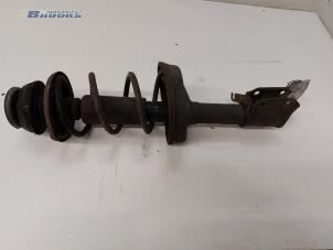 Used Front shock absorber rod, left Renault Twingo II (CN) 1.2 16V Price on request offered by Autobedrijf Brooks