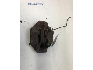 Used Front brake calliper, left Landrover Discovery I 2.5 TDi 300 Price € 50,00 Margin scheme offered by Autobedrijf Brooks