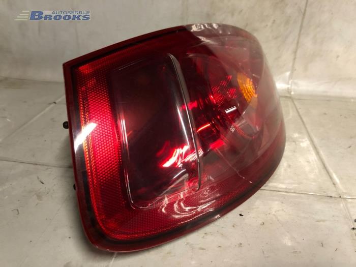 Taillight, left from a Fiat Bravo (198A) 1.4 MultiAir 16V 2011