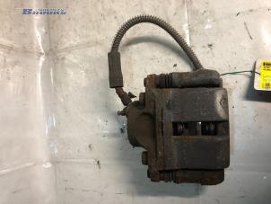 Used Front brake calliper, left Renault Twingo II (CN) 1.2 16V Price € 10,00 Margin scheme offered by Autobedrijf Brooks