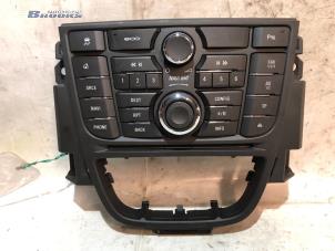 Used Radio control panel Opel Astra J Sports Tourer (PD8/PE8/PF8) 1.6 CDTI 16V Price € 90,00 Margin scheme offered by Autobedrijf Brooks