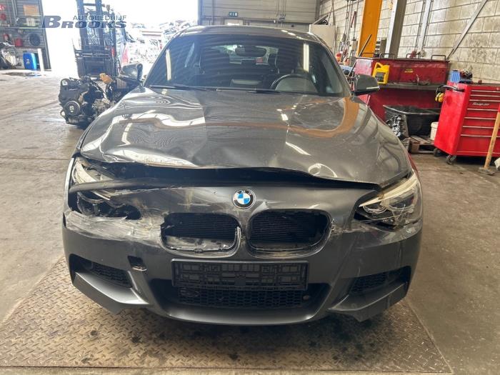 Zacisk hamulcowy lewy przód z BMW 1 serie (F20) 114i 1.6 16V 2015