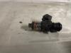 Injector (petrol injection) from a Renault Clio III (SR) 1.2 16V 75 2007