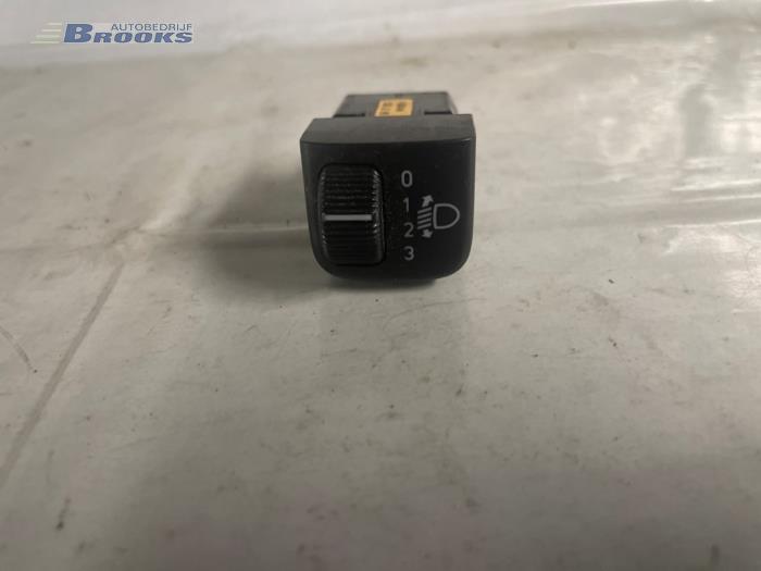 Headlight level height control switch