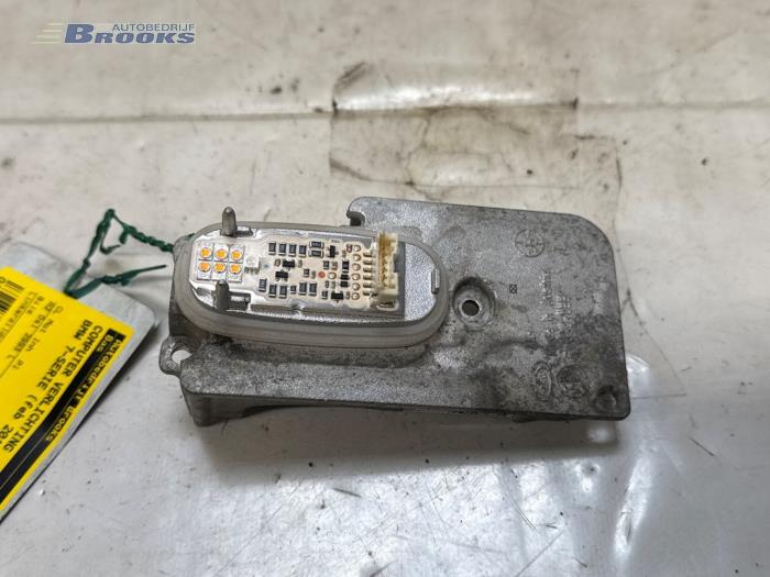 Usagé Ordinateur éclairage BMW 7 serie (F01/02/03/04) 740d 24V Prix € 35,00 Règlement à la marge proposé par Autobedrijf Brooks