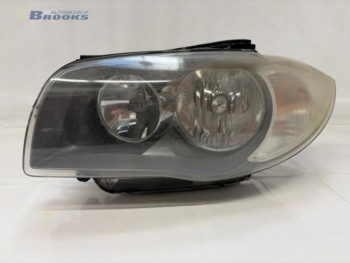 Używane Reflektor lewy BMW 1 serie (E81) 118d 16V Cena € 70,00 Procedura marży oferowane przez Autobedrijf Brooks