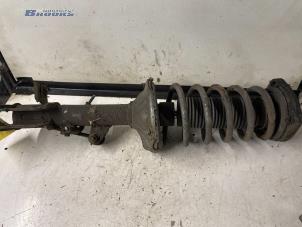 Used Rear shock absorber rod, left Hyundai Coupe 2.0i 16V Price € 15,00 Margin scheme offered by Autobedrijf Brooks
