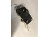 Central locking motor from a Audi A2 2003
