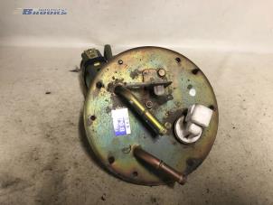 Usados Bomba eléctrica de combustible Mazda 323 F (BA14) 1.8i GLX,GT 16V Precio € 10,00 Norma de margen ofrecido por Autobedrijf Brooks
