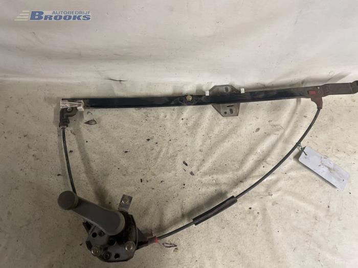 Door manual window regulator