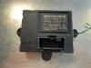 Central door locking module from a Ford Mondeo IV Wagon 1.6 EcoBoost 16V 2012