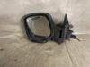 Wing mirror, left from a Peugeot Partner 1.9 D 1998