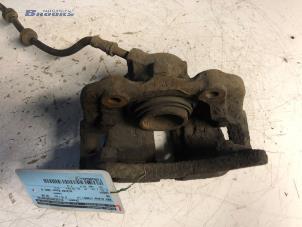 Used Front brake calliper, left Volkswagen Caddy II (9K9A) 1.9 SDI Price € 15,00 Margin scheme offered by Autobedrijf Brooks