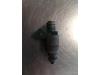 Injector (petrol injection) from a Volkswagen Golf IV (1J1) 1.6 1998