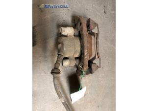 Used Front brake calliper, right BMW 3 serie (E36/4) 325 td Price € 10,00 Margin scheme offered by Autobedrijf Brooks