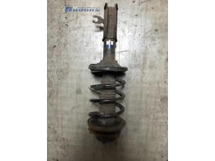 Used Front shock absorber rod, right Mazda 323 Price € 25,00 Margin scheme offered by Autobedrijf Brooks