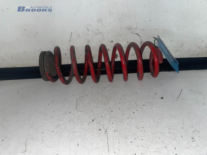 Rear coil spring from a Seat Ibiza III (6L1) 1.4 16V 75 2002